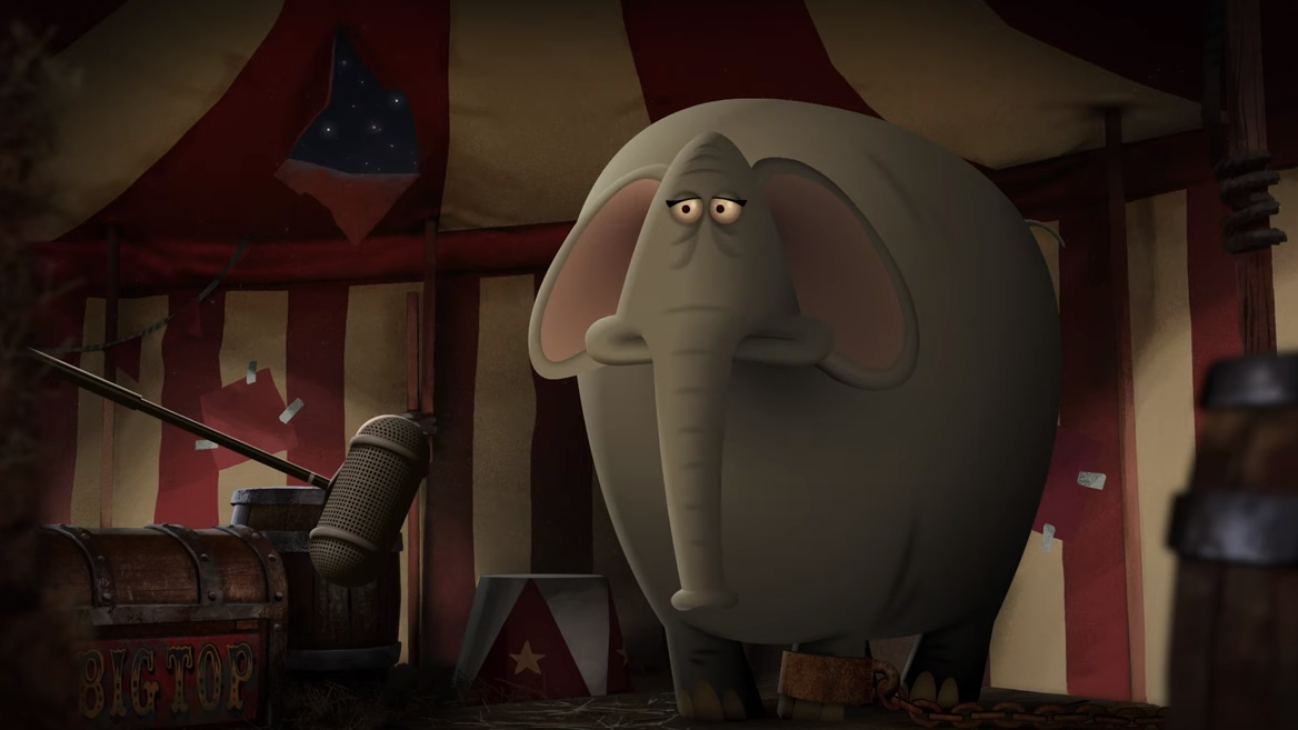 An animated elephant in a circus is stood behind a microphone.