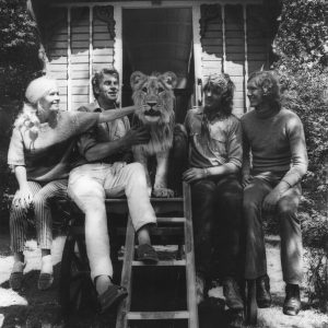 Christian the Lion sat in the entrance of a caravan