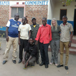 Isaac Banda with local community members