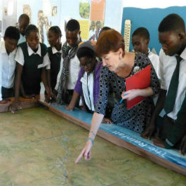 Anna Tolan with a group of school children