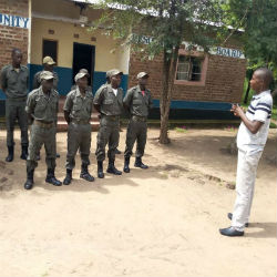 Isaac Banda with wildlife scouts