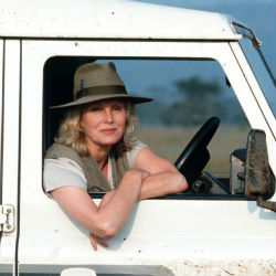 Joanna Lumley in a white jeep on location in Africa