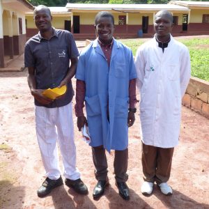 Three men stand in a line wearing teaching uniforms