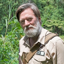 Ian Redmond wearing a Born Free shirt whilst in the jungle