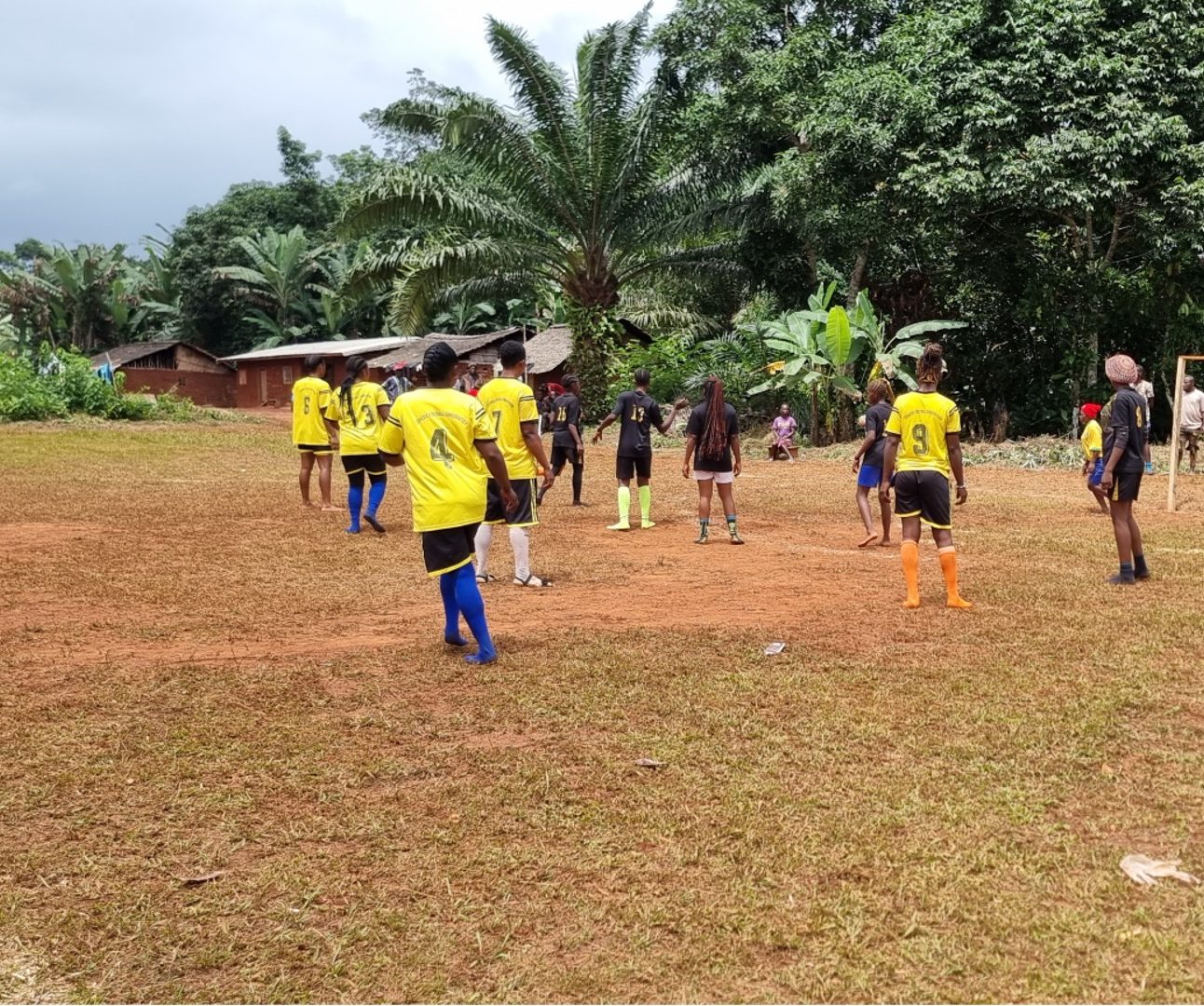 A group of people playing football in Cameroon