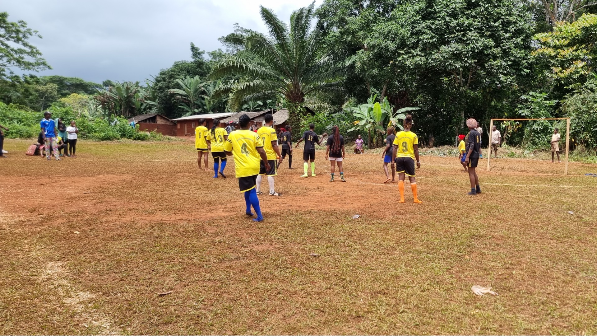 A group of people playing football in Cameroon