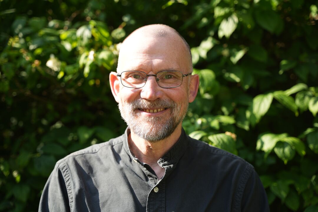 A headshot of Dr Mark Jones