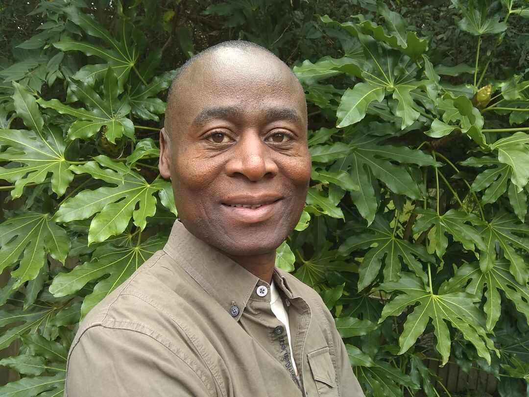 A headshot of Manny Mvula