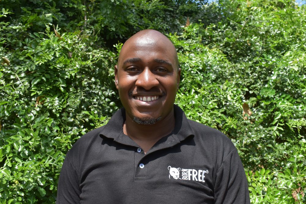 A headshot of Martin Ayua Kanga