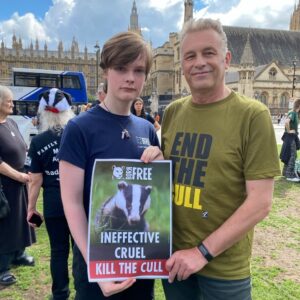 Born Free Youth Ambassador Hector Bateman with Chris Packham at a march against the badger cull in 2024